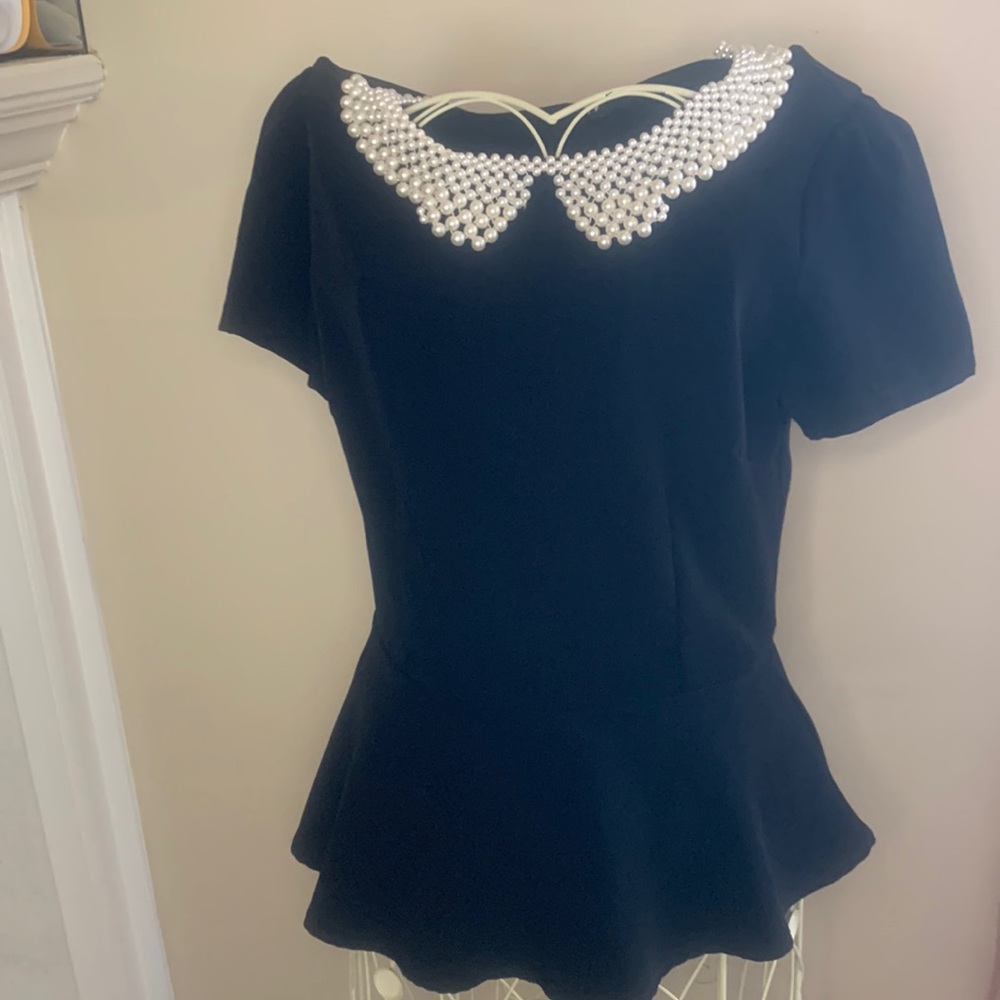 Forever21 Black top  Embellished  with pearl Neckline Size Small.